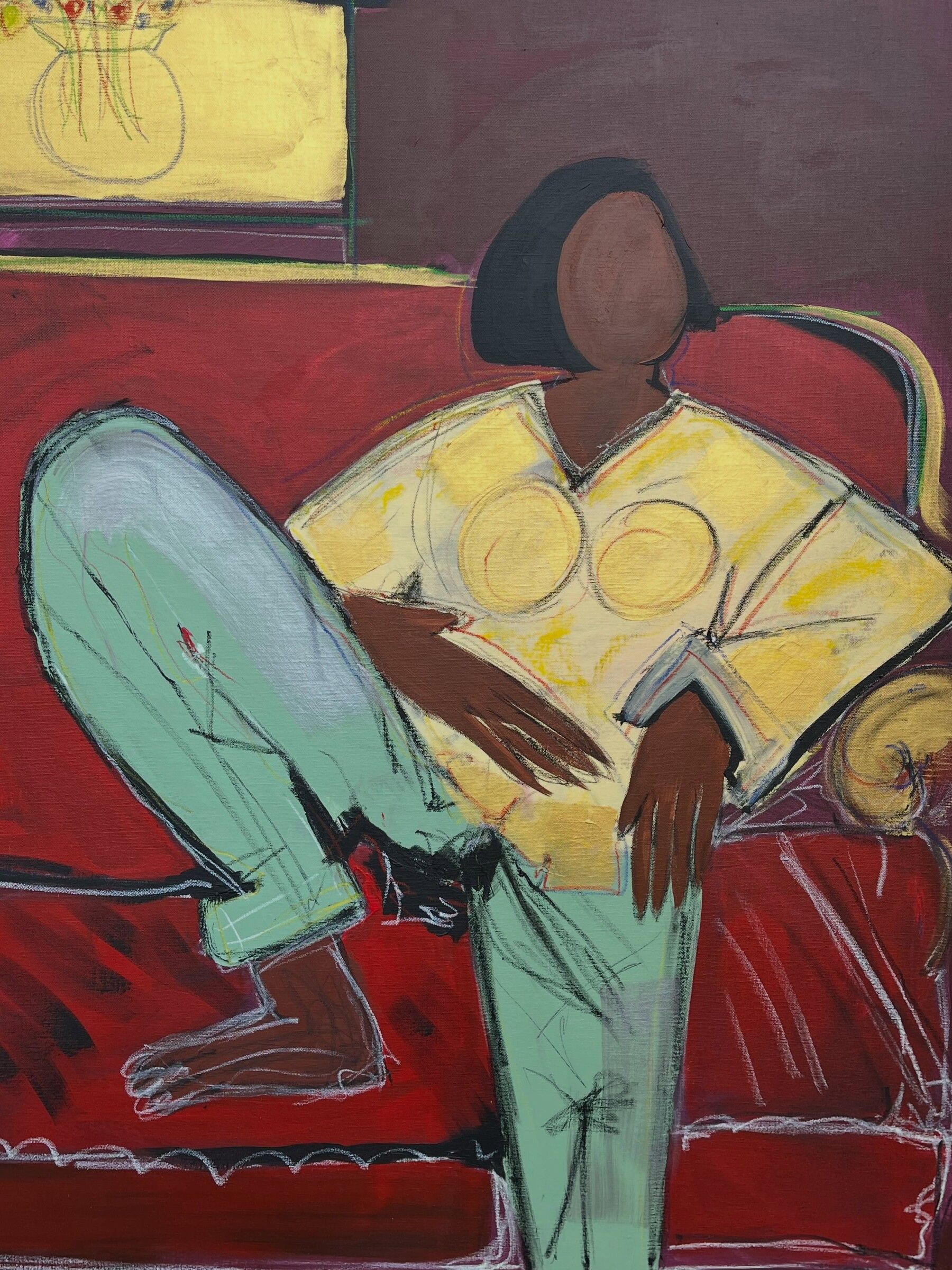 Sunday, late afternoon: a faceless woman in a yellow shirt and mint trousers lounging on a red sofa